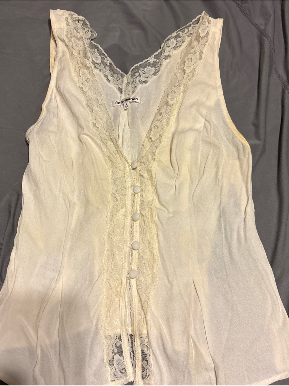 Reformation women top size 4